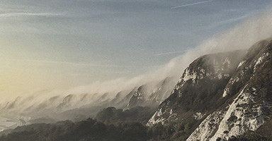 Photo of a mountain range printed on metallic paper. Metallic paper is available from both Fuji and Kodak and has a very high gloss finish and would be best framed using anti refelctive glass.