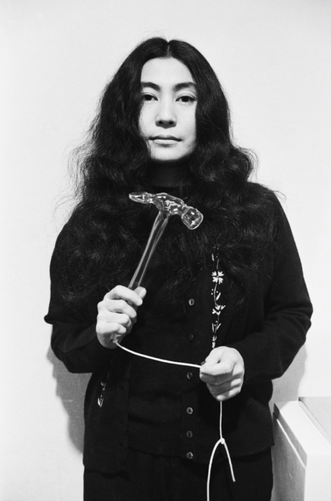 Yoko Ono with glass hammer 1967